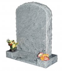 A M.P. White granite memorial, with a pitched margin and a simple shape.