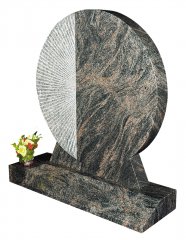 A Himalayan Blue granite memorial with hand worked detail.