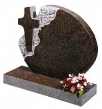 An Indian Mahogany granite memorial, with a cross and carved roses.