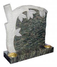 A Kerala Green granite memorial with a carved tree design.