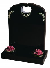 A Black granite memorial with simple coloured roses.